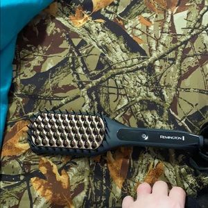 Hair straightening brush.